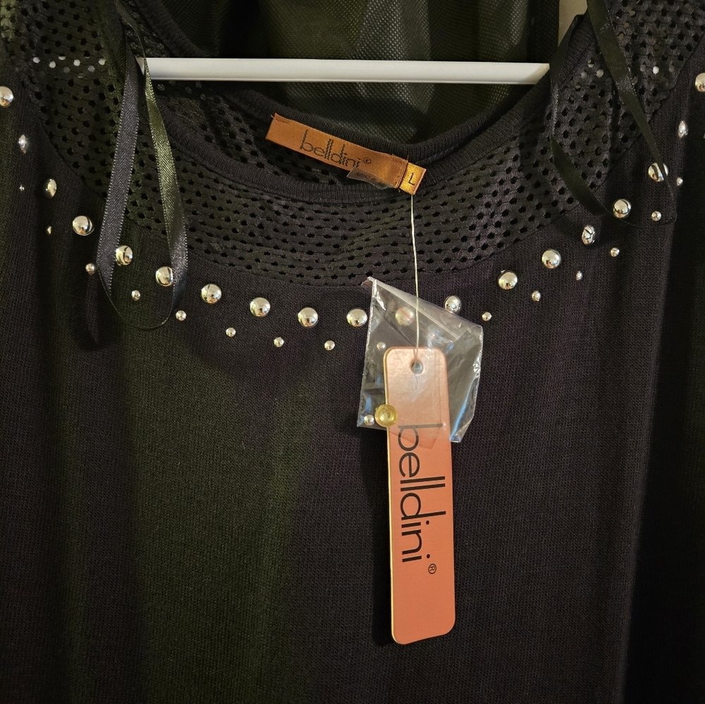 Women's black shirt with silver studs.